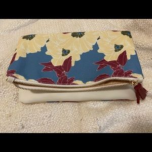 Cute reversible clutch.